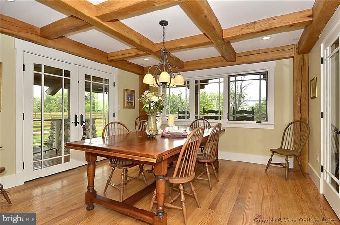 18340 Cattail Road Poolesville, MD 20837 - Photo 13 of 30 a dining room with furniture window wooden floor
