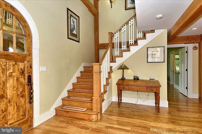 18340 Cattail Road Poolesville, MD 20837 - Photo 3 of 30 a view of entryway and hall with wooden floor