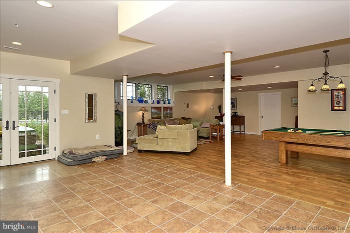 18340 Cattail Road Poolesville, MD 20837 - Photo 21 of 30 a view of a livingroom with furniture and a rug
