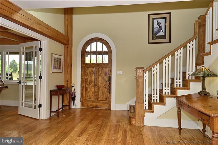 18340 Cattail Road Poolesville, MD 20837 - Photo 23 of 30 a view of entryway and hall with wooden floor