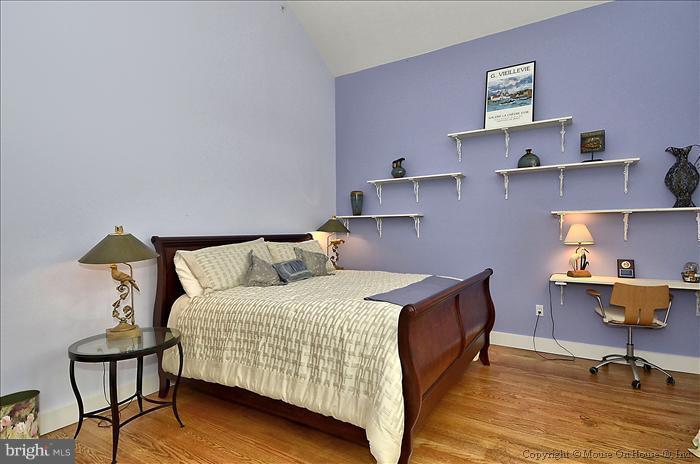 18340 Cattail Road Poolesville, MD 20837 - Photo 26 of 30 a bedroom with a bed and a desk in it