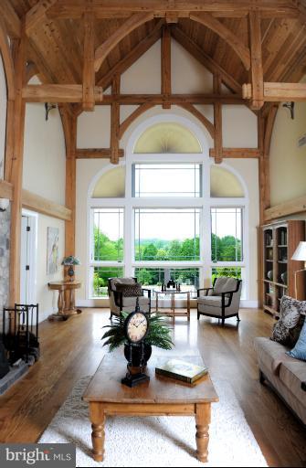 18340 Cattail Road Poolesville, MD 20837 - Photo 28 of 30 a living room with fireplace furniture and a large window