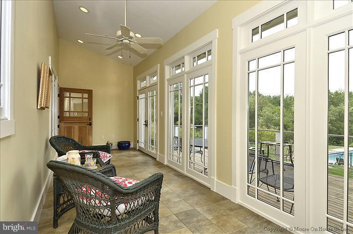 18340 Cattail Road Poolesville, MD 20837 - Photo 7 of 30 a living room with furniture and a large window