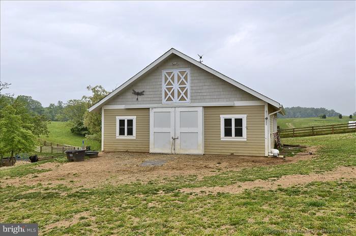 18340 Cattail Road Poolesville, MD 20837 - Photo 10 of 30 a view of front of house with a yard