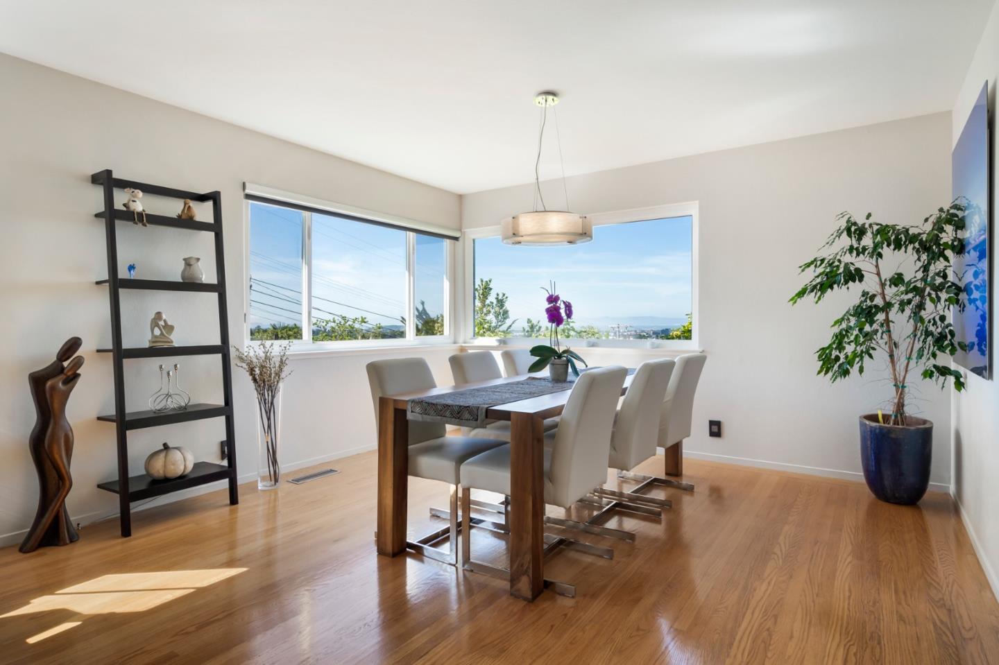 863 Viewridge Drive San Mateo, CA 94403 - Photo 11 of 50 a workspace with furniture window and wooden floor