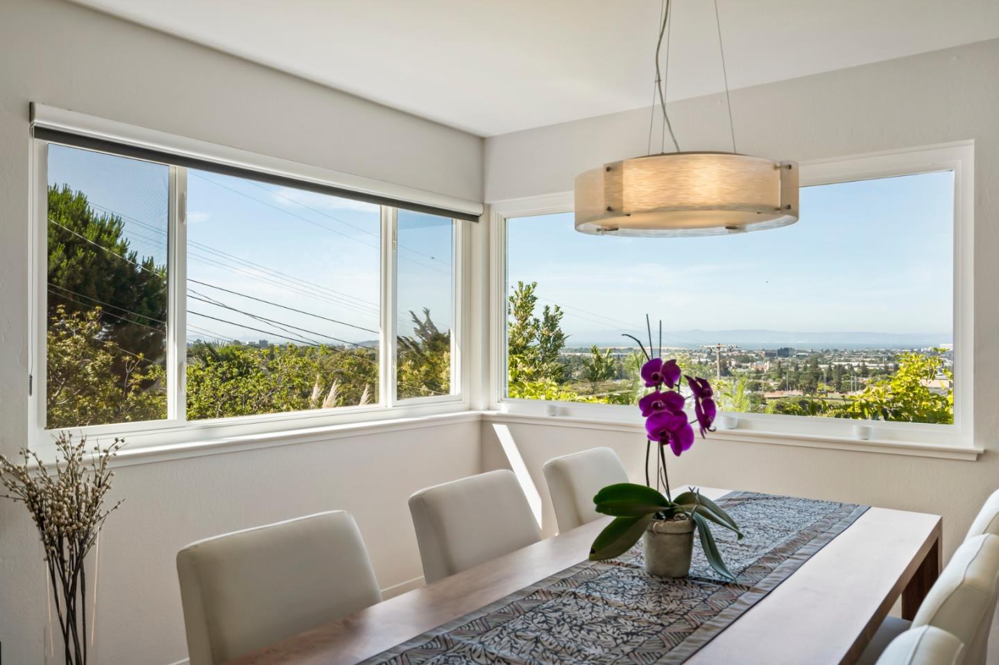863 Viewridge Drive San Mateo, CA 94403 - Photo 12 of 50 a living room with furniture and a flat screen tv
