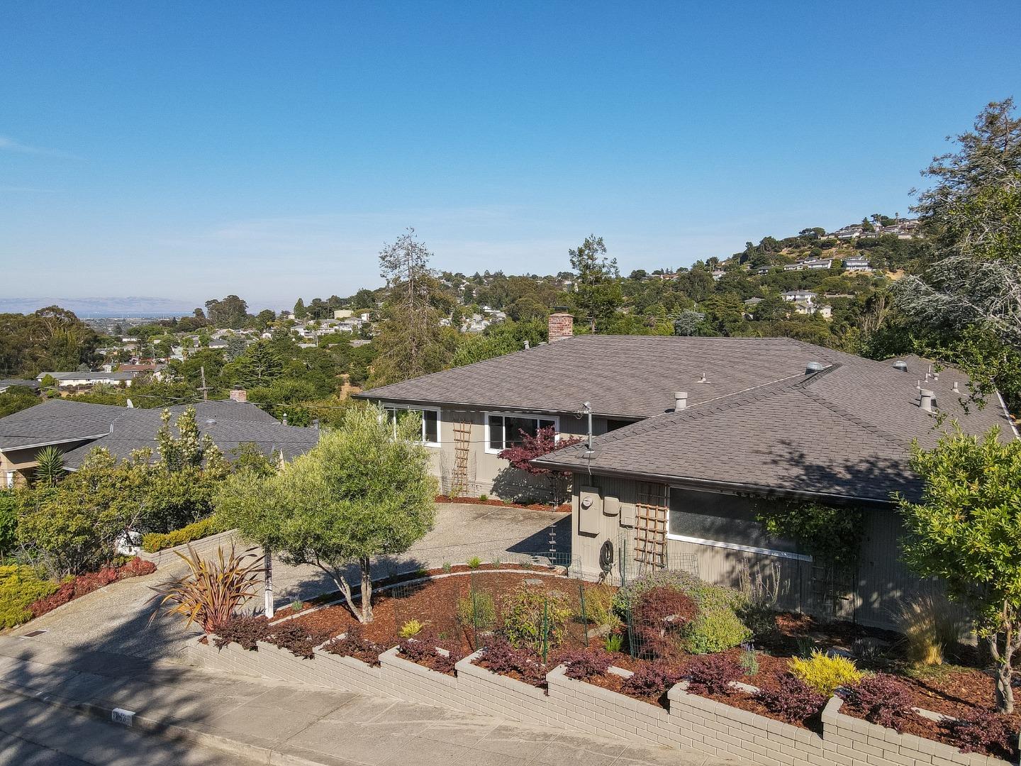 863 Viewridge Drive San Mateo, CA 94403 - Photo 2 of 50 an aerial view of a house