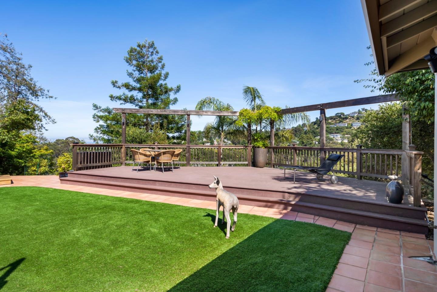 863 Viewridge Drive San Mateo, CA 94403 - Photo 25 of 50 a view of a bench in a garden