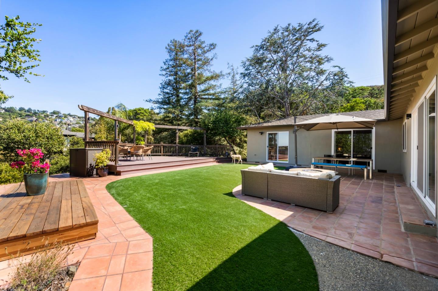 863 Viewridge Drive San Mateo, CA 94403 - Photo 27 of 50 a view of a house and a back yard