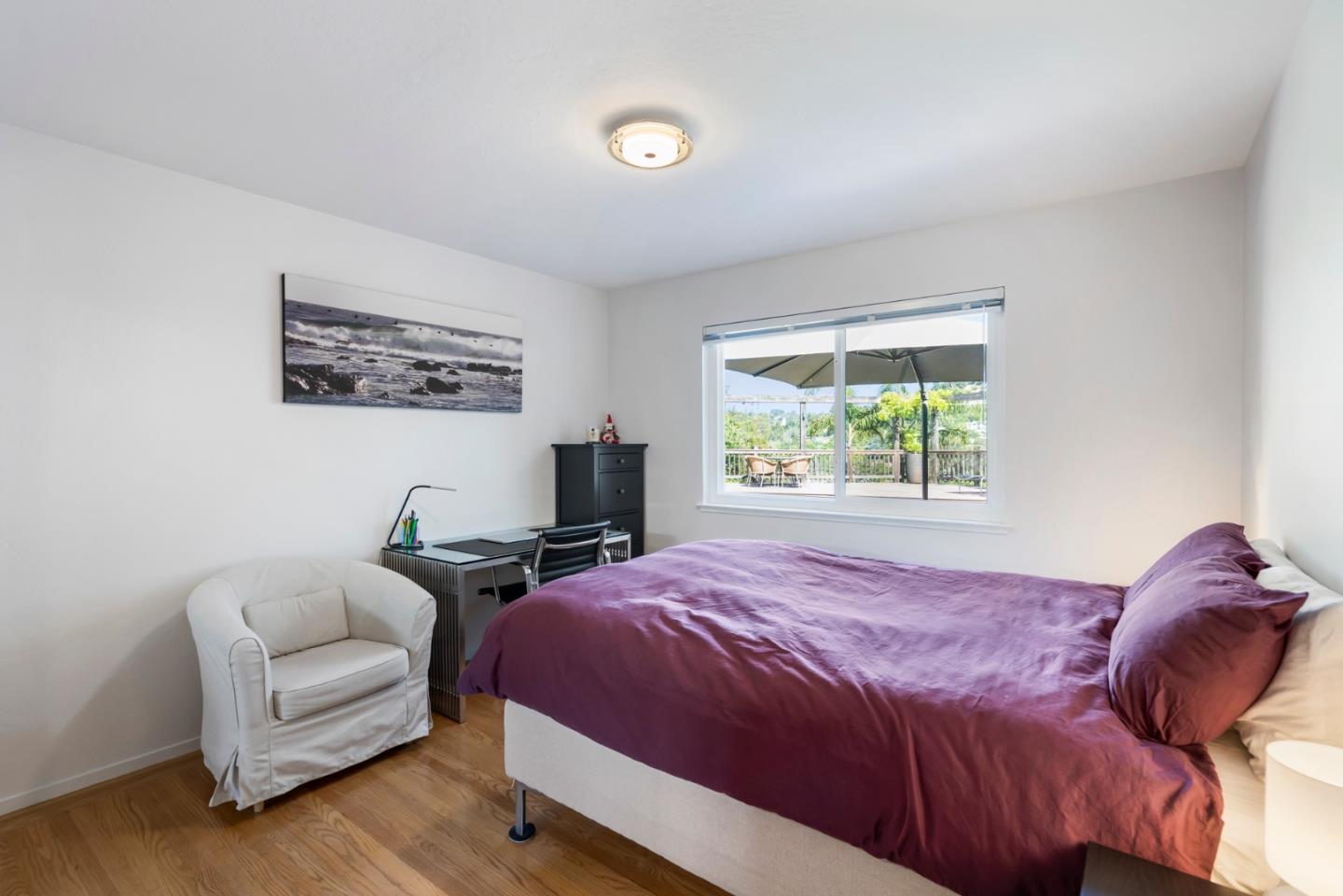 863 Viewridge Drive San Mateo, CA 94403 - Photo 38 of 50 a bedroom with a bed and a couch