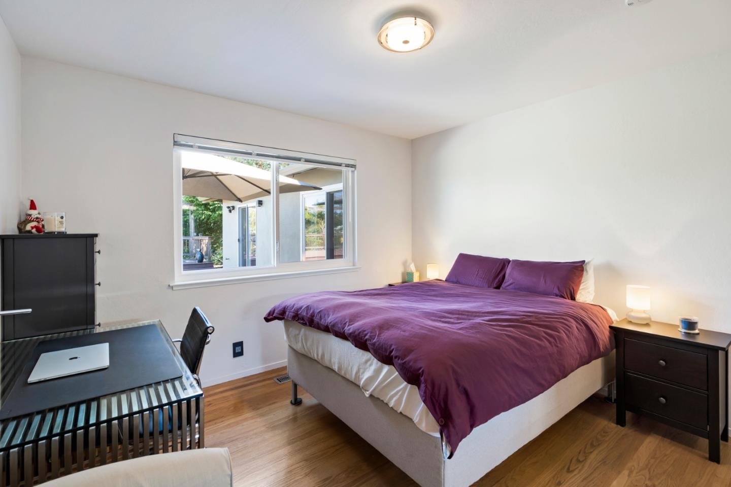 863 Viewridge Drive San Mateo, CA 94403 - Photo 39 of 50 a bedroom with a bed and a window