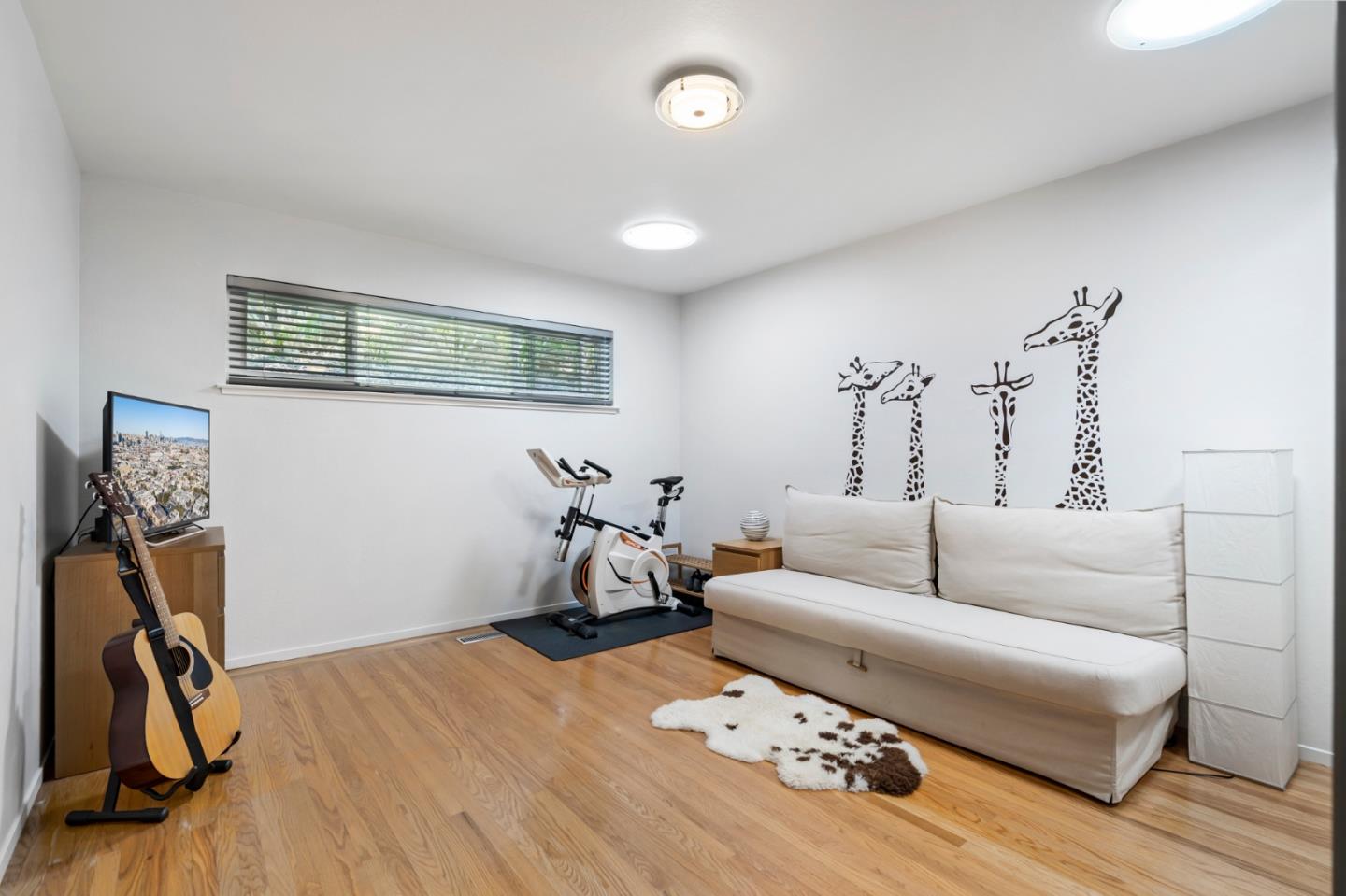 863 Viewridge Drive San Mateo, CA 94403 - Photo 40 of 50 a living room with furniture and a wooden floor