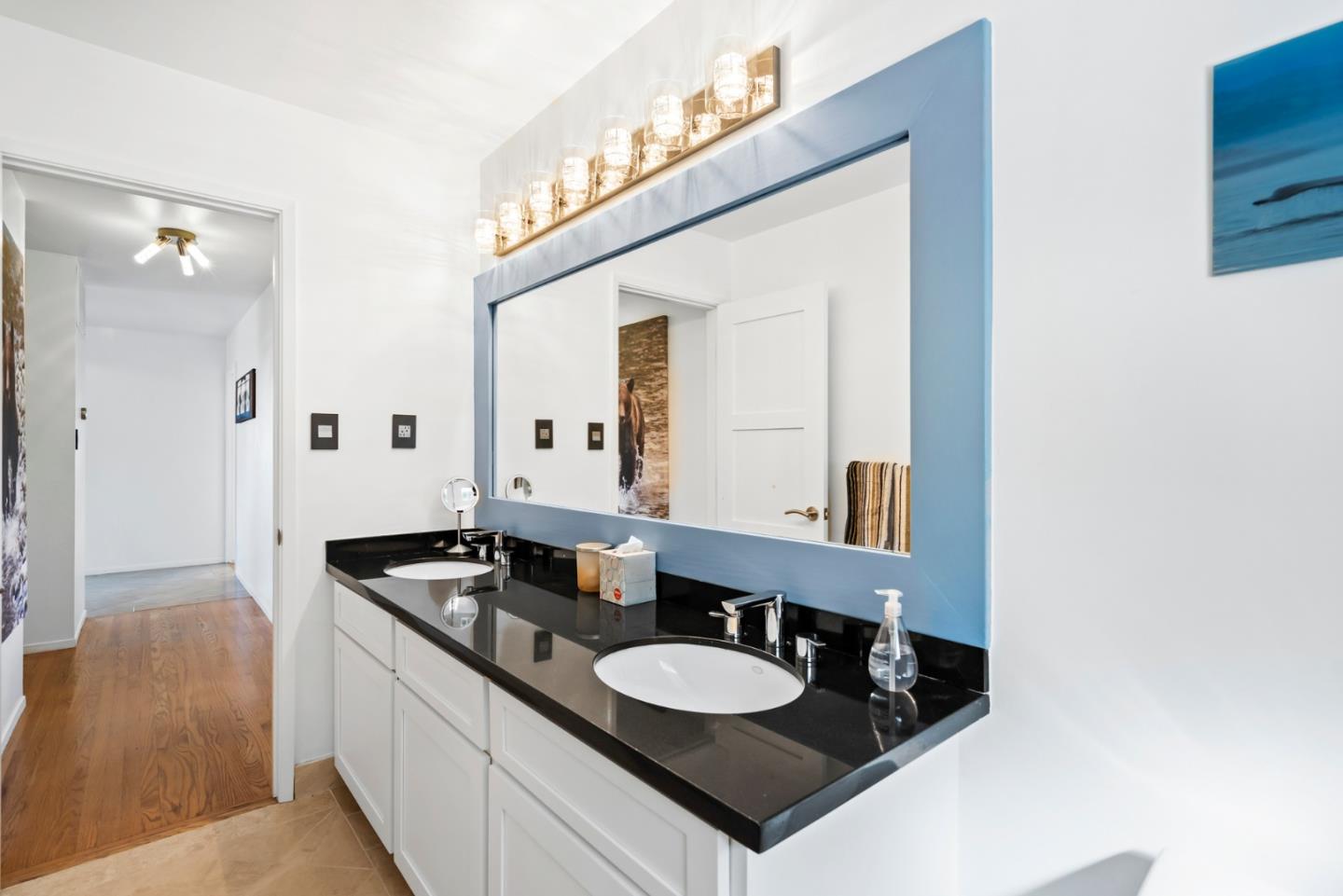 863 Viewridge Drive San Mateo, CA 94403 - Photo 43 of 50 a bathroom with a sink and a mirror