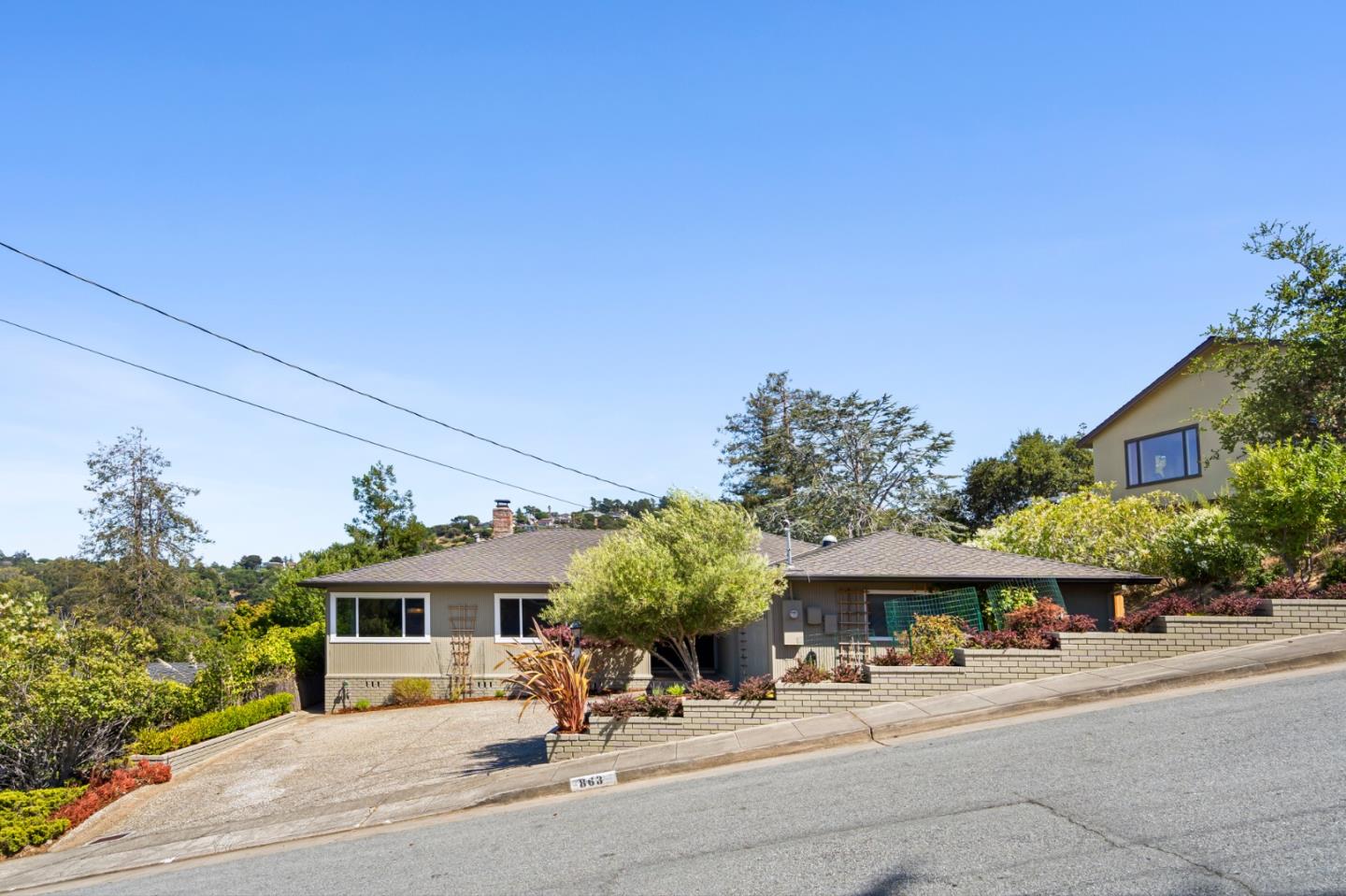 863 Viewridge Drive San Mateo, CA 94403 - Photo 46 of 50 a view of a building with a street