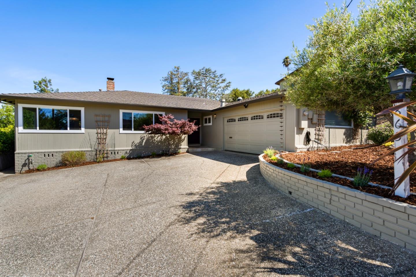 863 Viewridge Drive San Mateo, CA 94403 - Photo 49 of 50 a front view of a house with garden