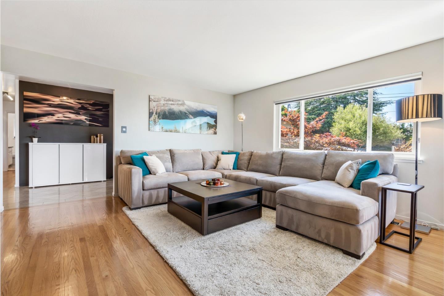 863 Viewridge Drive San Mateo, CA 94403 - Photo 5 of 50 a living room with furniture and a large window