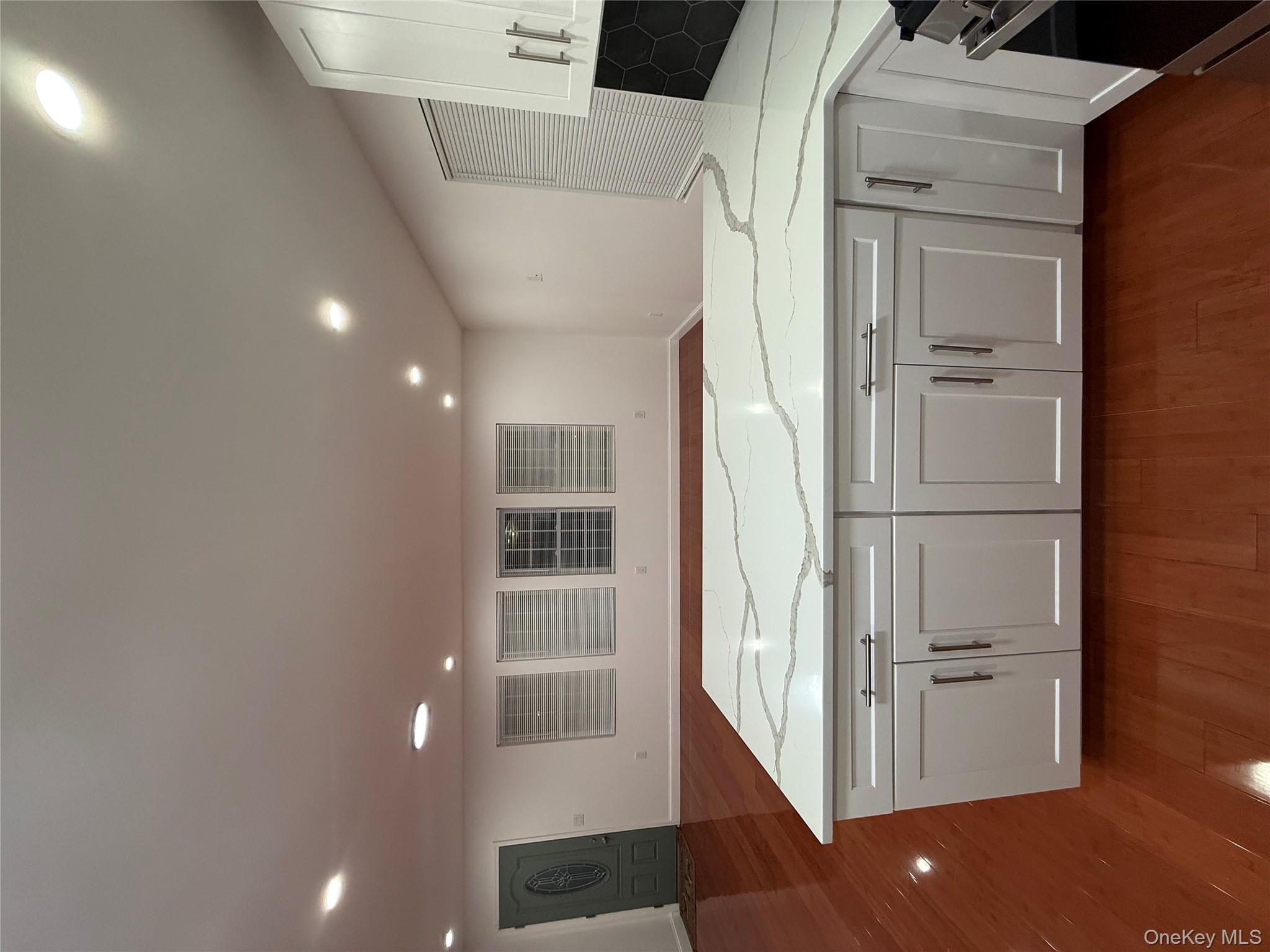 107-13 220th Street Queens, NY 11429 - Photo 10 of 10 a utility room with a sink