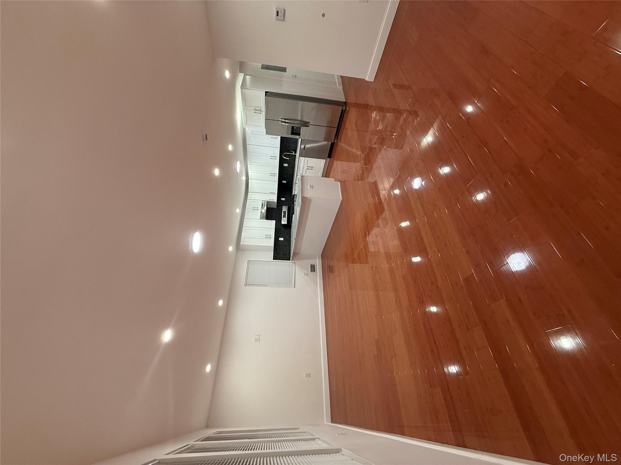 107-13 220th Street Queens, NY 11429 - Photo 3 of 10 a view of a hall with an outdoor space