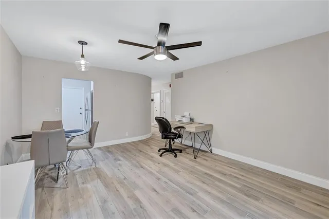 a workspace with wooden floor