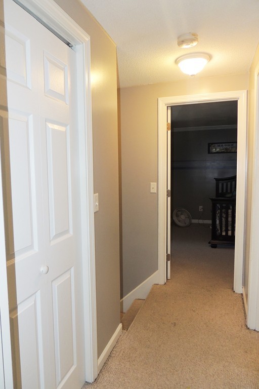 49 Wing Street Springfield, MA 01151 - Photo 10 of 19 a view of a room with a wardrobe space