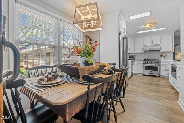 a view of a storage and utility room with washer and dryer