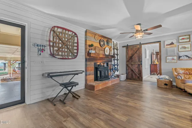 a bed room with a bed and a chandelier