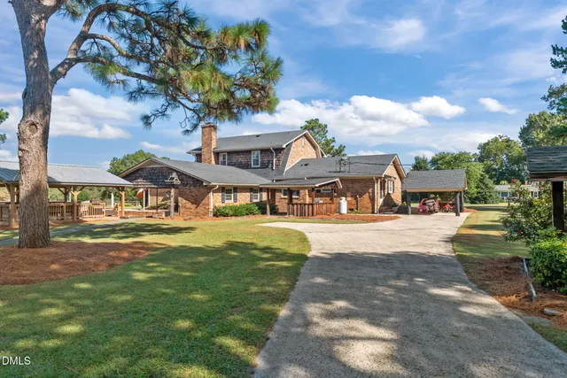 a view of a chairs and tables in the balcony