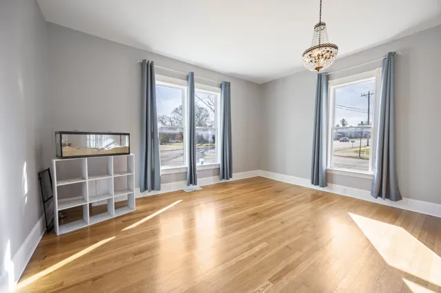 a view of hallway with windows