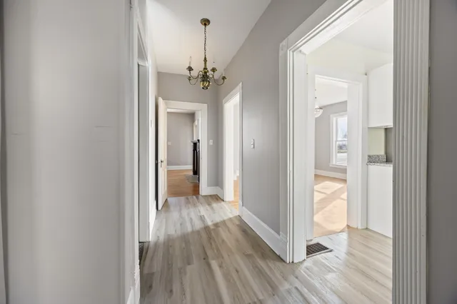 a picture of a room with a white wall and white walls