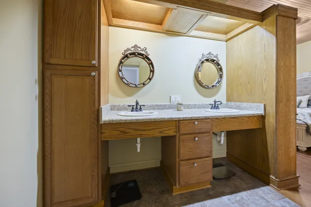 a view of an empty room and a window