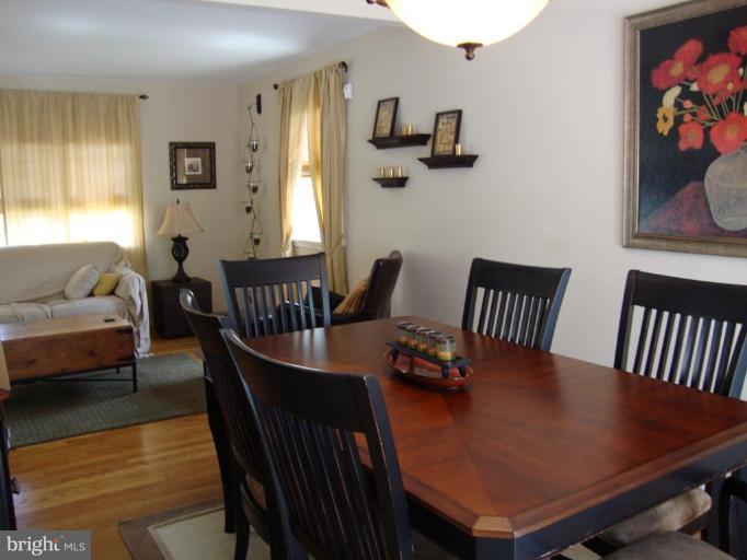 Formal dining room w/wood floors