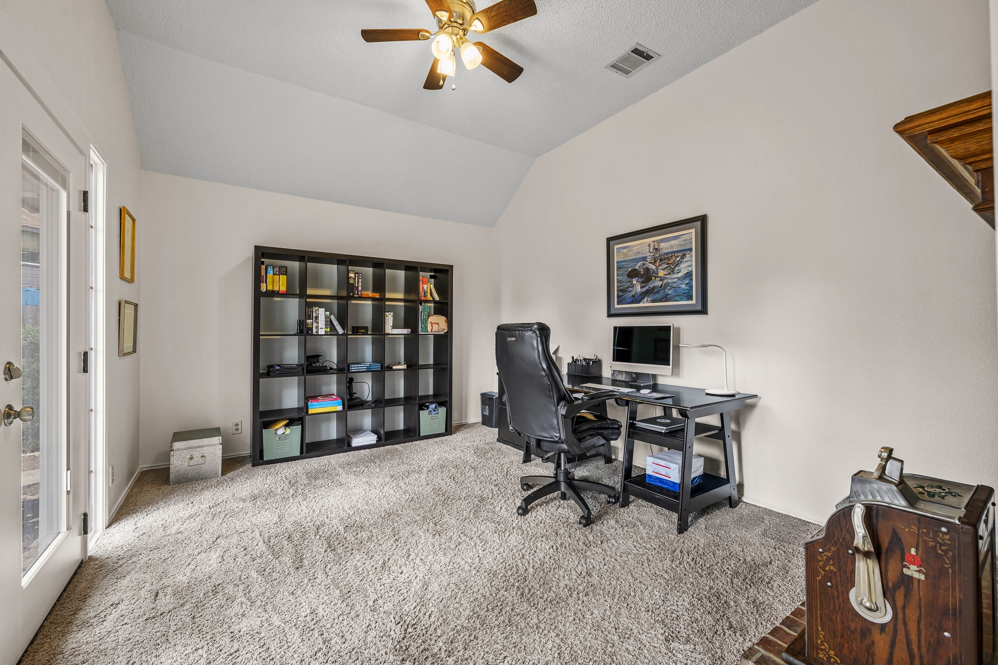 4801 Counts Cove Austin, TX 78749 - Photo 13 of 40 a view of a workspace with furniture and a ceiling fan