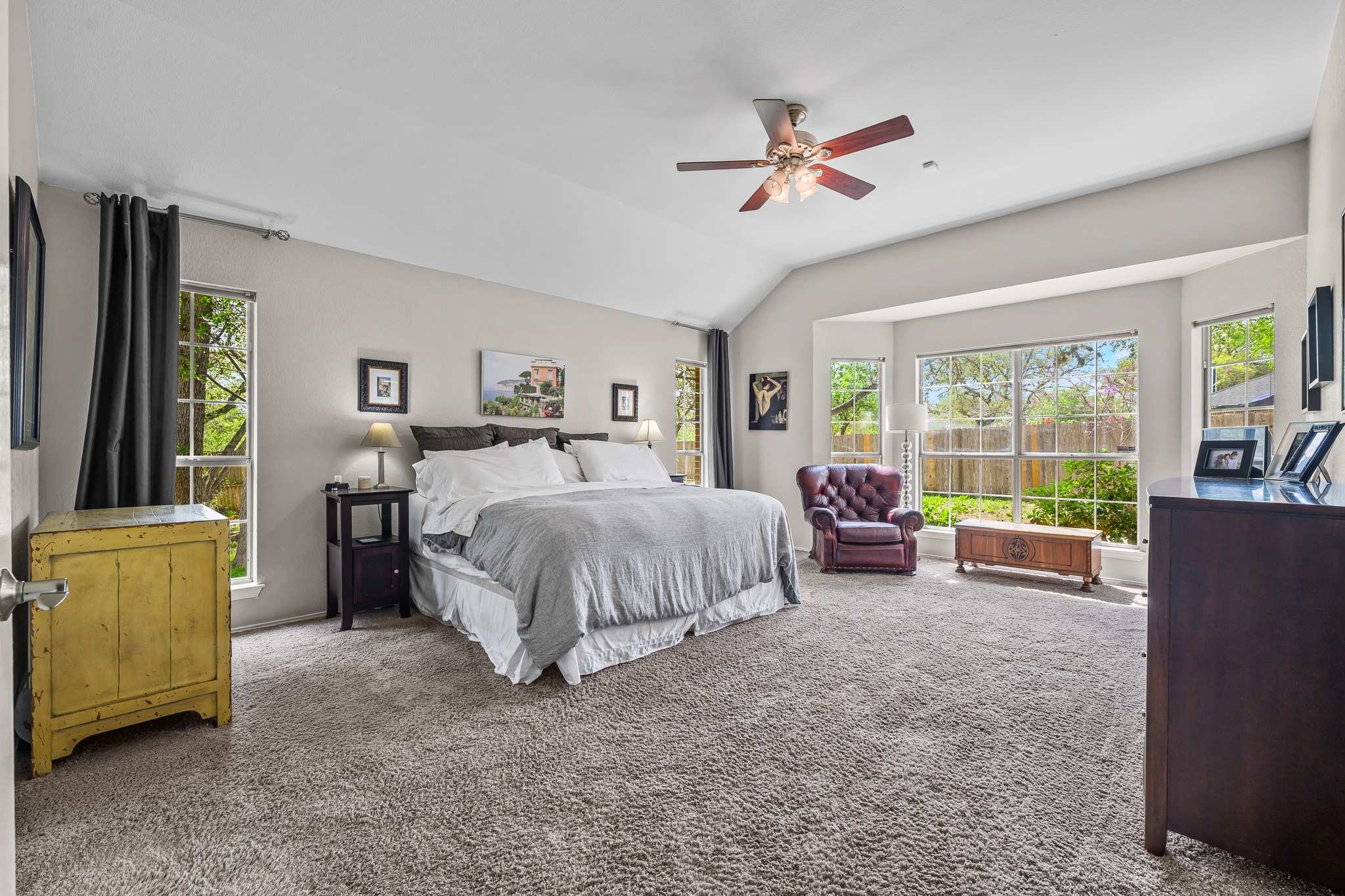 4801 Counts Cove Austin, TX 78749 - Photo 15 of 40 a spacious bedroom with a bed and a couch