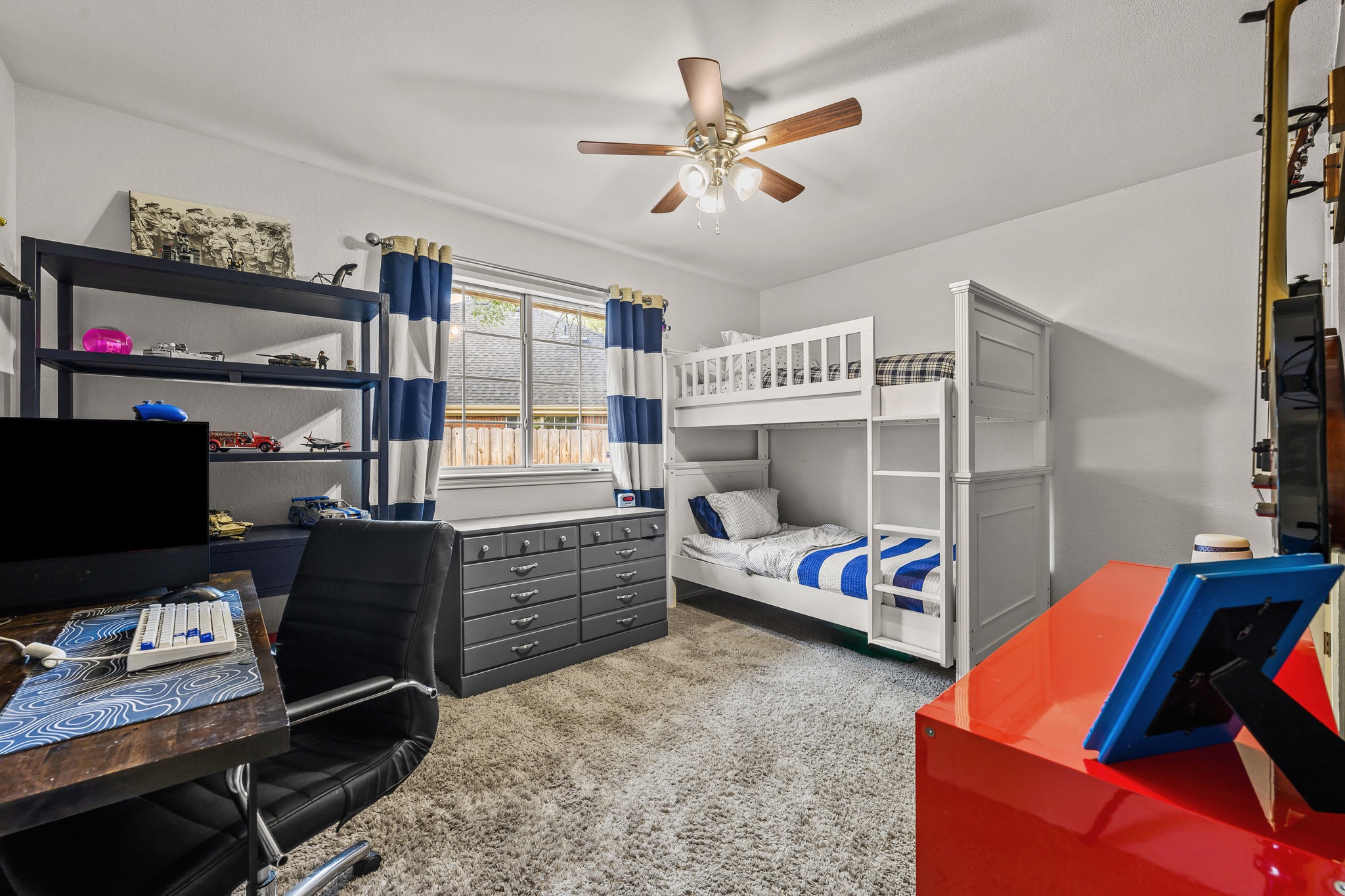 4801 Counts Cove Austin, TX 78749 - Photo 21 of 40 a bedroom with a bed and a tv