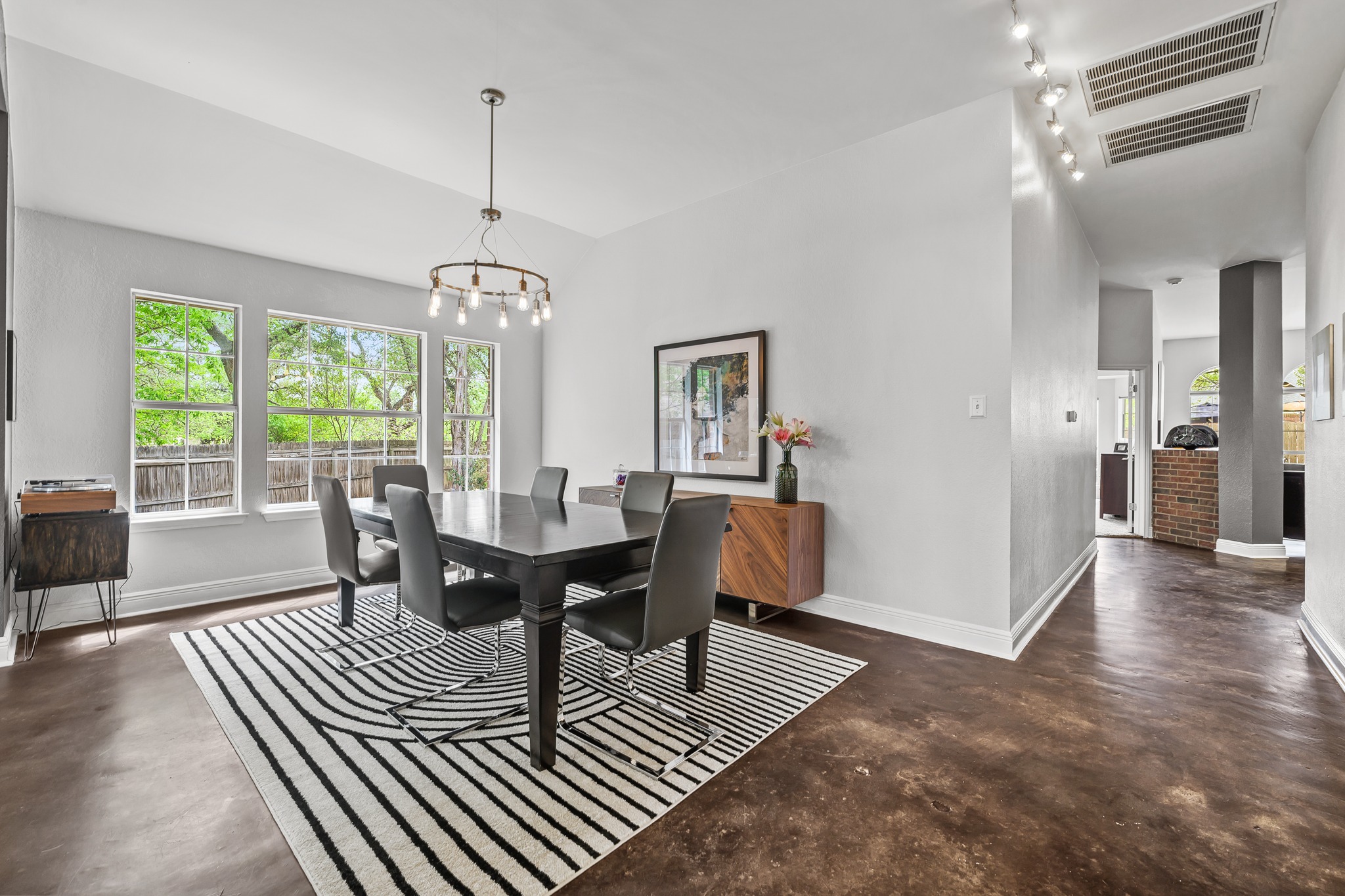 4801 Counts Cove Austin, TX 78749 - Photo 39 of 40 a view of a dining room with furniture window and wooden floor