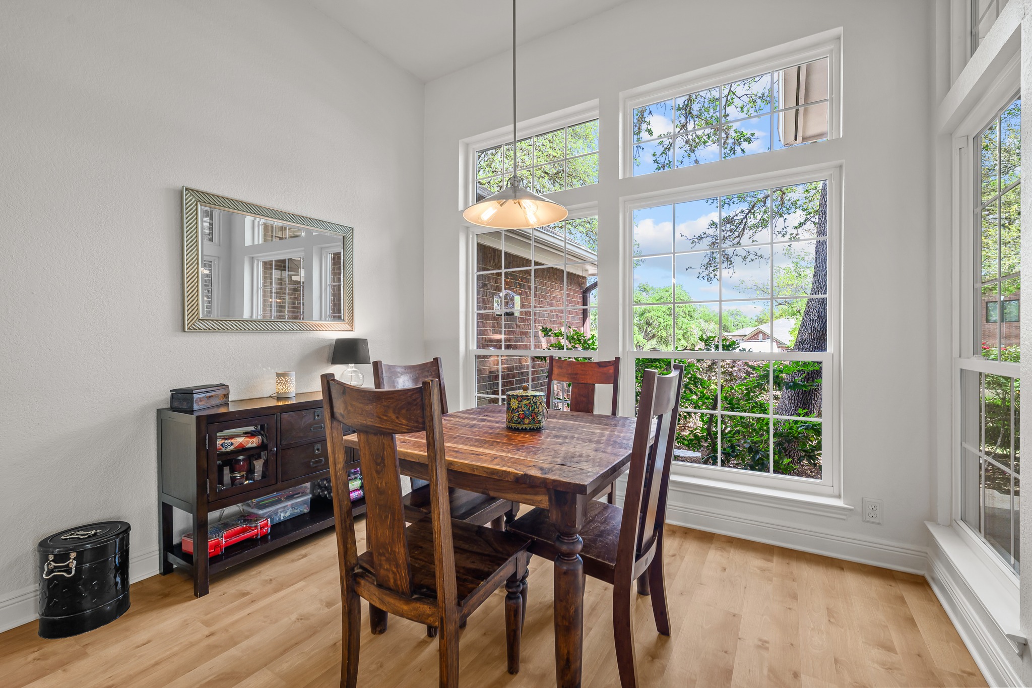 4801 Counts Cove Austin, TX 78749 - Photo 6 of 40 a dining room with furniture window and wooden floor