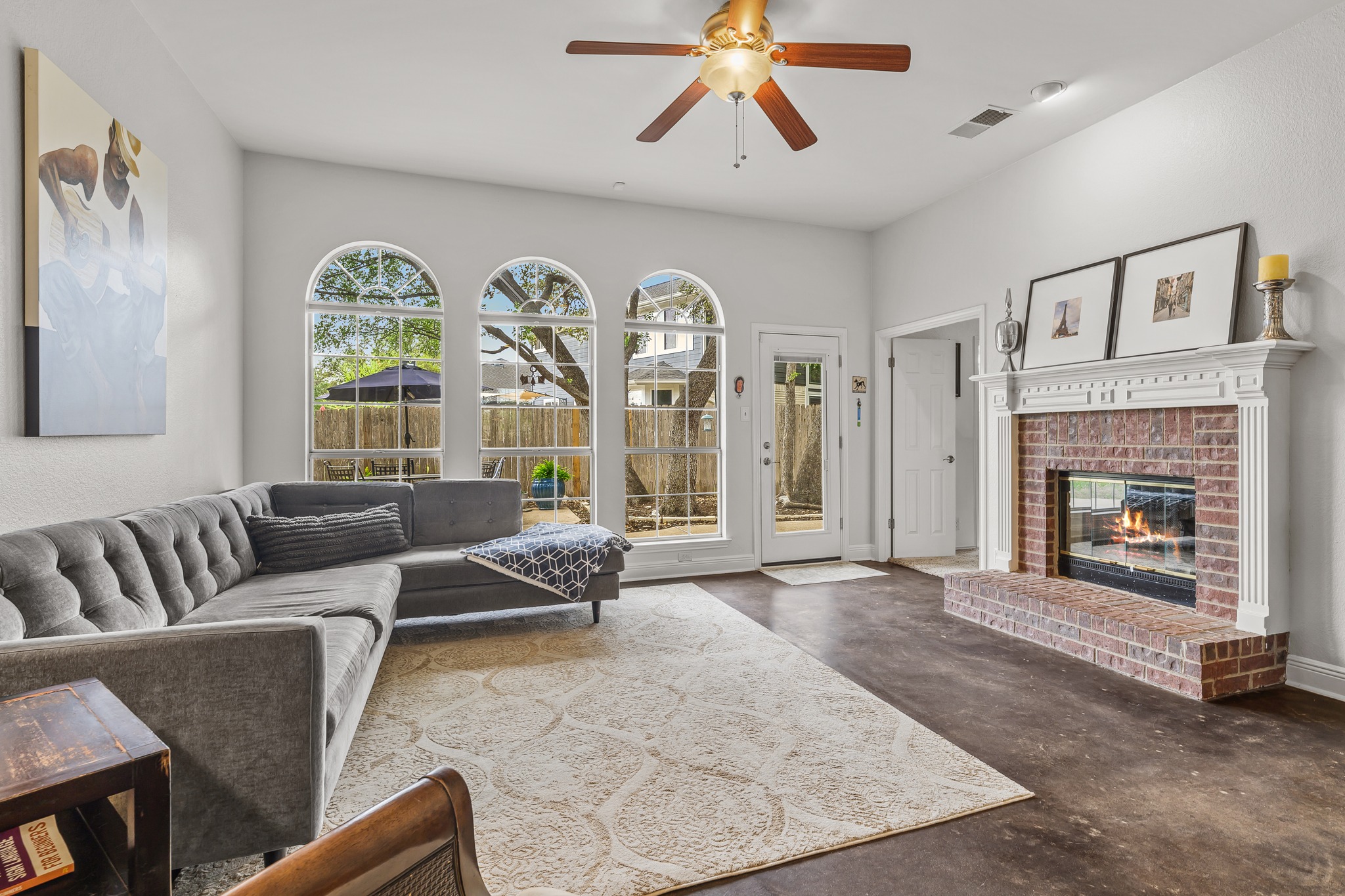 4801 Counts Cove Austin, TX 78749 - Photo 9 of 40 a living room with furniture and a fireplace