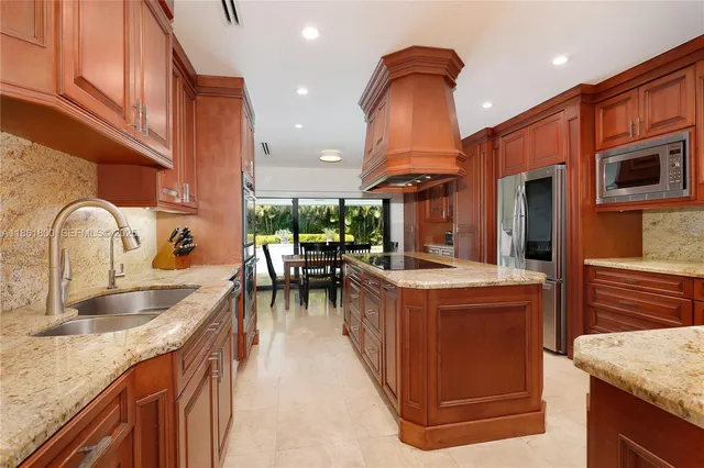 a kitchen with a stove and a sink