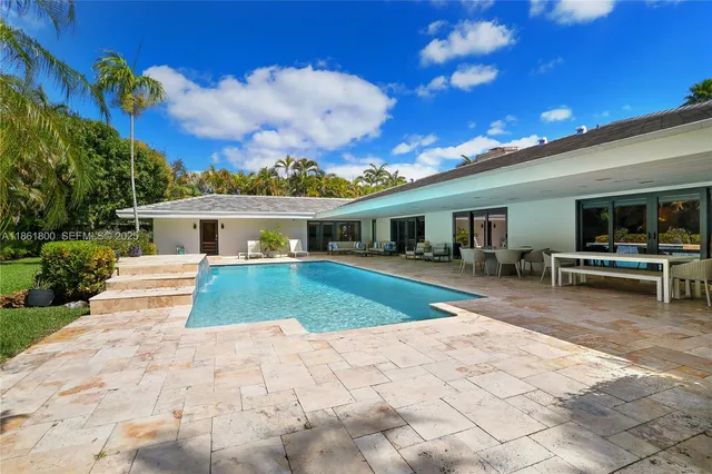 a view of outdoor space yard deck and swimming pool