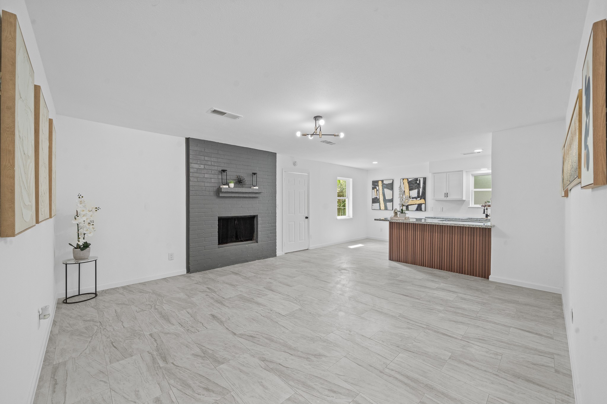 15415 West Hampton Circle Houston, TX 77071 - Photo 13 of 35 a view of a kitchen with a sink and a refrigerator
