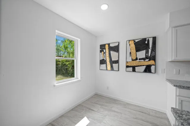 an empty room with windows