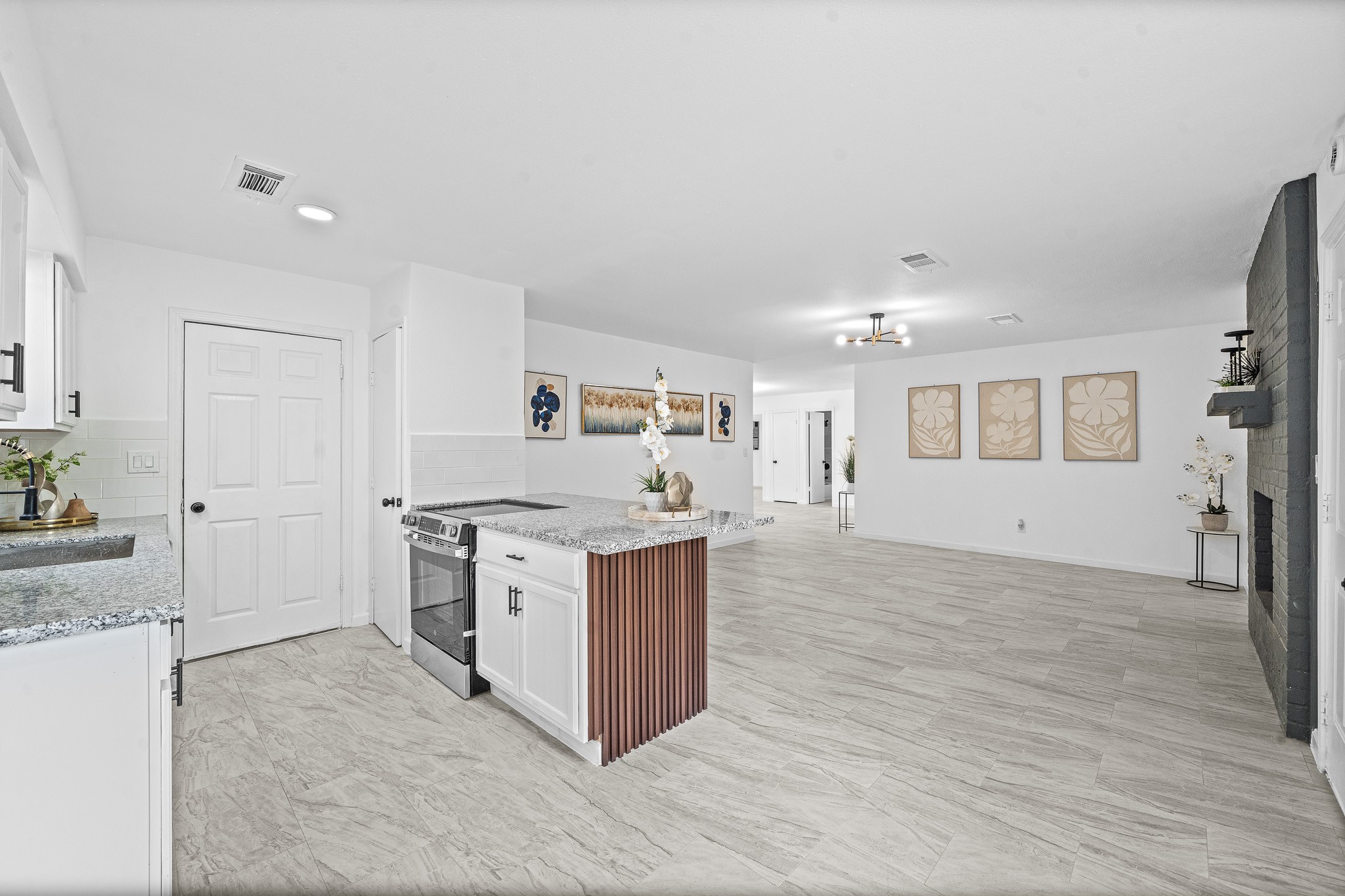 15415 West Hampton Circle Houston, TX 77071 - Photo 18 of 35 a kitchen with stainless steel appliances granite countertop a stove and a sink