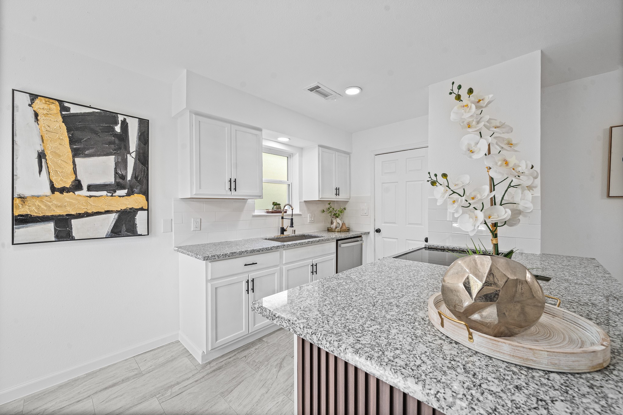 15415 West Hampton Circle Houston, TX 77071 - Photo 19 of 35 a kitchen with a sink a stove and wooden floor