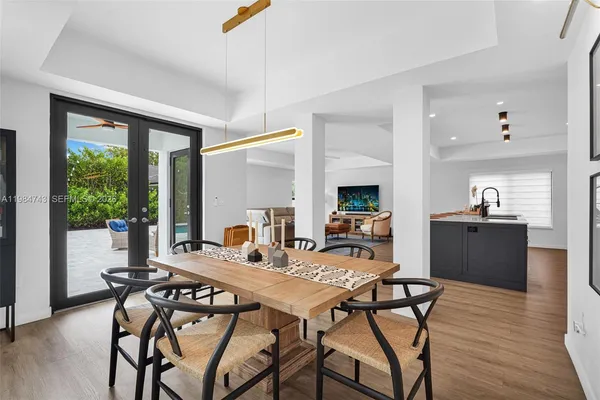 a large kitchen with stainless steel appliances