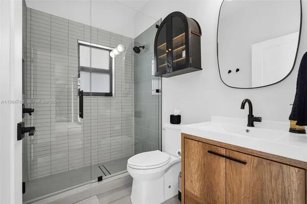 a bedroom with a bed and closet