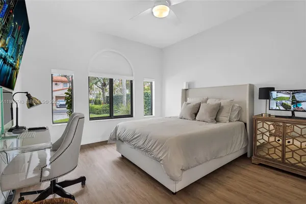 a bedroom with a bed and a walk in closet