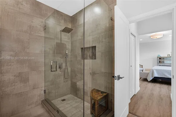 a view of a white house with a patio