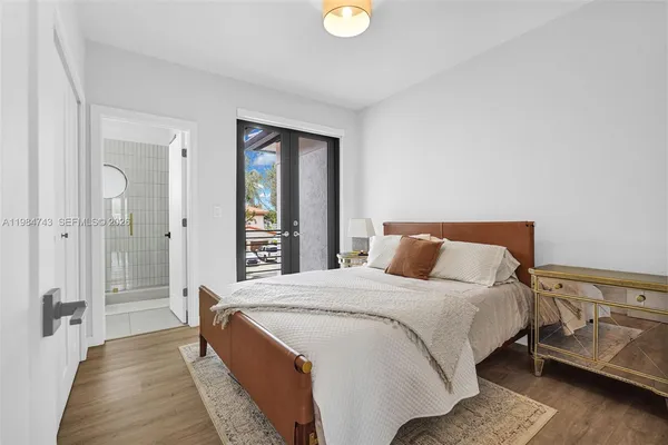 a view of a house with swimming pool and sitting area