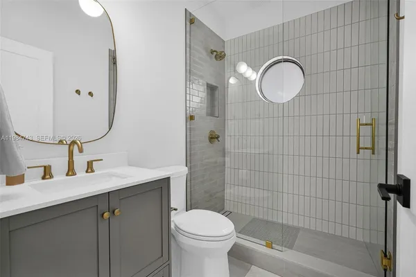 a view of backyard with plants and outdoor seating