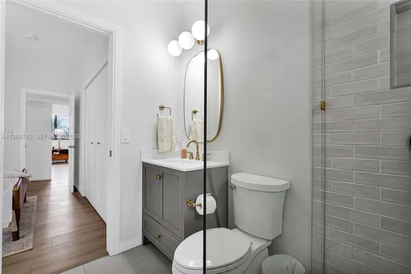 a view of a patio with table and chairs and potted plants
